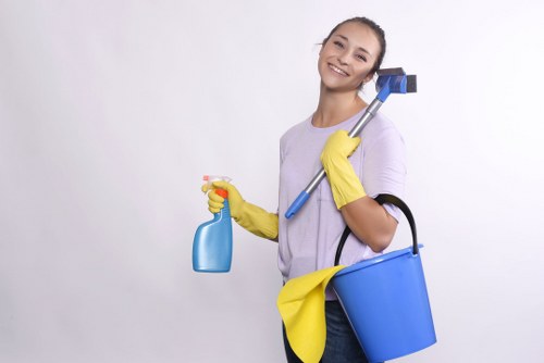 Cleaner preparing a kitchen for move in cleaning in Wandsworth